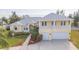 Two-story house with double garage and balcony at 924 Bunker View Dr, Apollo Beach, FL 33572