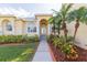 Landscaped front yard with walkway leading to house entry at 924 Bunker View Dr, Apollo Beach, FL 33572