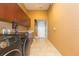 Bright laundry room with washer, dryer, and ample cabinetry at 924 Bunker View Dr, Apollo Beach, FL 33572