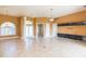 Open concept living space with tile floors and columns at 924 Bunker View Dr, Apollo Beach, FL 33572