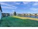 Spacious backyard with lake view and lush grass at 9928 Ivory Dr, Ruskin, FL 33573