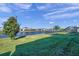 Backyard oasis with lake view and privacy fence at 9928 Ivory Dr, Ruskin, FL 33573