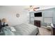 Spacious bedroom with a ceiling fan, large windows and plenty of room for furniture at 9928 Ivory Dr, Ruskin, FL 33573