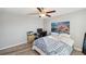 Cozy bedroom with a large wall art and a work station at 9928 Ivory Dr, Ruskin, FL 33573