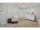 Spacious Bedroom with a dresser, rocking chair and plenty of room to play at 9928 Ivory Dr, Ruskin, FL 33573