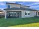 Two-story home with covered patio and fenced backyard at 9928 Ivory Dr, Ruskin, FL 33573