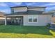 Two-story home with covered patio and fenced backyard at 9928 Ivory Dr, Ruskin, FL 33573