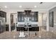 Kitchen with dark cabinets, granite countertops, and stainless steel appliances at 9928 Ivory Dr, Ruskin, FL 33573