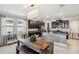 Spacious kitchen featuring dark cabinetry, granite countertops, and an island at 9928 Ivory Dr, Ruskin, FL 33573