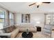 Relaxing living room showcasing a comfy sectional sofa and tasteful decor at 9928 Ivory Dr, Ruskin, FL 33573
