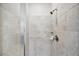 Large tiled shower with glass enclosure and modern fixtures at 9928 Ivory Dr, Ruskin, FL 33573