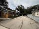 Property view showcasing ample parking and a fenced yard at 2011 Auburn S St, St Petersburg, FL 33712