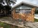 Cute bungalow with stone exterior and a spacious yard at 2011 Auburn S St, St Petersburg, FL 33712