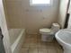 Updated bathroom with tiled shower and flooring at 11365 8Th E St, Treasure Island, FL 33706