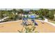 Community playground with play structures near pool at 12404 52Th E St, Parrish, FL 34219