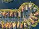 Aerial view of upscale community with lake access and many homes at 18052 Java Isle Dr, Tampa, FL 33647