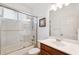 Clean bathroom with a shower/tub combo and single vanity at 18052 Java Isle Dr, Tampa, FL 33647