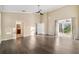 Spacious bedroom with wood floors and access to a private bathroom at 18052 Java Isle Dr, Tampa, FL 33647