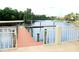 Private dock with access to a calm lake at 18052 Java Isle Dr, Tampa, FL 33647