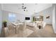 Spacious living room with tile floors, and sliding doors leading to the backyard at 18052 Java Isle Dr, Tampa, FL 33647