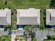 Single-story home with gray roof and landscaped yard at 2407 Locksley St # 224, Sun City Center, FL 33573