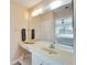 Bathroom with sink, vanity, and mirror at 2407 Locksley St # 224, Sun City Center, FL 33573