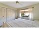 Bedroom with large bed and built-in wardrobe at 2407 Locksley St # 224, Sun City Center, FL 33573