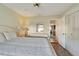Bedroom with queen bed and access to the hallway at 2407 Locksley St # 224, Sun City Center, FL 33573