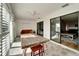 Enclosed patio with seating and access to the living room at 2407 Locksley St # 224, Sun City Center, FL 33573