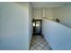Clean and bright entryway with tiled flooring and an exterior door at 2407 Locksley St # 224, Sun City Center, FL 33573