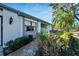 Landscaped pathway leading to the front entrance of the home at 2407 Locksley St # 224, Sun City Center, FL 33573
