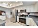 Updated kitchen, stainless steel appliances, and ample counter space at 2407 Locksley St # 224, Sun City Center, FL 33573