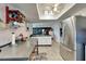 Well-equipped kitchen with stainless steel appliances and breakfast bar at 2407 Locksley St # 224, Sun City Center, FL 33573