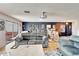 Open living room showcasing hardwood floors and ample seating at 2407 Locksley St # 224, Sun City Center, FL 33573