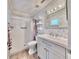 Updated bathroom with modern vanity and shower at 2575 Shenandoah St, North Port, FL 34287