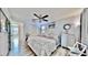 Spacious bedroom with king-size bed and private access to bathroom at 2575 Shenandoah St, North Port, FL 34287