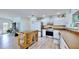 Updated kitchen featuring stainless steel appliances and wood island at 2575 Shenandoah St, North Port, FL 34287