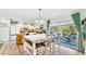 Bright and airy kitchen and dining area with access to the backyard patio at 2575 Shenandoah St, North Port, FL 34287