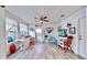 Relaxing sunroom with plenty of natural light and comfortable seating at 2575 Shenandoah St, North Port, FL 34287