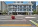 Street level view of modern highrise building entrance at 301 1St S St # 205, St Petersburg, FL 33701