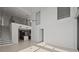 High-ceiling living area with loft and modern kitchen at 301 1St S St # 205, St Petersburg, FL 33701