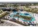 Resort-style pool with expansive sundeck and clubhouse at 31496 Woodland Race Loop, Wesley Chapel, FL 33545