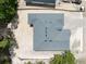Bird's-eye view of the property showing the layout, roof, and surrounding landscape at 5062 Elm Leaf Dr, Brooksville, FL 34601