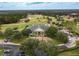 Aerial view of clubhouse near golf course at 5062 Elm Leaf Dr, Brooksville, FL 34601