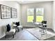 Home office with two comfortable armchairs and a modern desk at 5062 Elm Leaf Dr, Brooksville, FL 34601