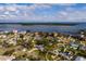 An aerial view showcases a single-Gathering home, a private pool, and a large backyard at 5801 Venetian Ne Blvd, St Petersburg, FL 33703