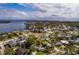 An aerial view of a single Gathering home with a pool and large backyard in a quiet residential neighborhood at 5801 Venetian Ne Blvd, St Petersburg, FL 33703