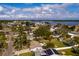Aerial view of a house with a large backyard, showcasing the property's location and surroundings at 5801 Venetian Ne Blvd, St Petersburg, FL 33703