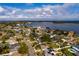 Aerial view of a house and neighborhood, showcasing the property's location and surroundings at 5801 Venetian Ne Blvd, St Petersburg, FL 33703