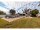 Backyard with a pool, patio, and pergola providing ample outdoor space at 5801 Venetian Ne Blvd, St Petersburg, FL 33703